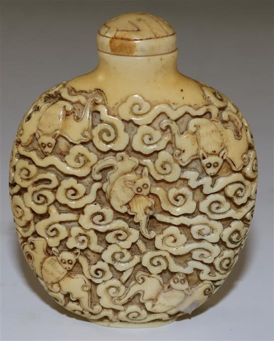 A rare Chinese ivory five bats snuff bottle, 1800-1900, Richards no. 421, matched stopper